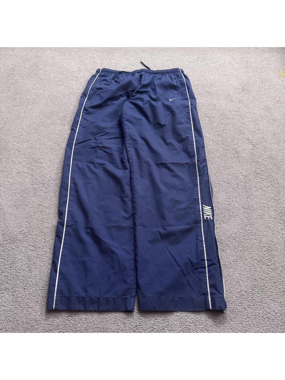 Vintage Y2K Navy Blue Nike Track Pants with the Spellout and side stripes
